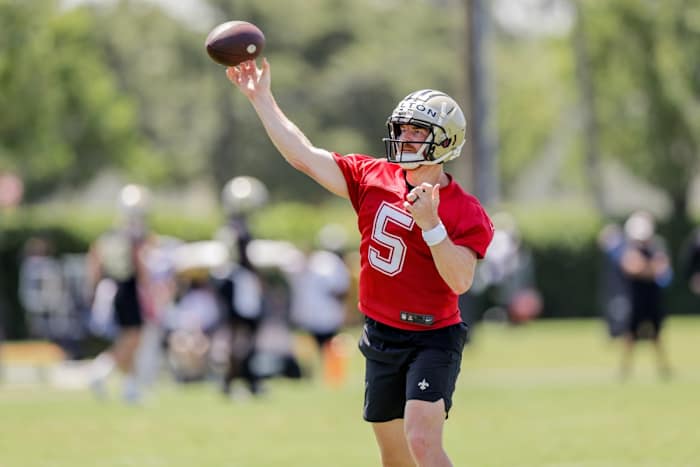 New Orleans Saints Andy Dalton (5) works on passing drills during organized team activities at the Saints Training Facility. Mandatory Credit: Stephen Lew-USA TODAY Sports